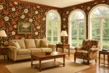 Cabin Rose Wallpaper with floral pattern, shown on the walls of a cozy living room.