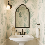 Botanical wintergreen sketch wallpaper with branch pattern, visible in the mirror.
