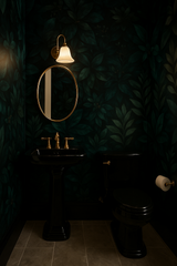 Dark green botanical wallpaper featuring a leafy pattern.