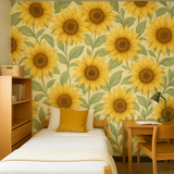 Yellow sunflower wallpaper with leafy vines, covering an interior wall.

