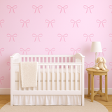 Coquette Bows wallpaper with pink bow pattern on a pink background.
