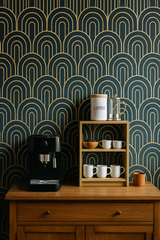 Art deco wallpaper featuring teal arches with gold trim, against a dark background.

