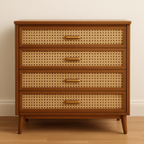 Brown wooden dresser with rattan weave drawers, decorative handles, and tapered legs.