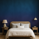Mystic Mirage Wallpaper with a gradient blue color wash, showcasing a textured finish.
