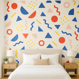 Modern Memphis Wallpaper with geometric pattern on a bedroom wall.
