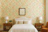 Tuscany Trellis wallpaper with a geometric and leaf pattern, styled in a bedroom setting.