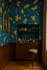 Patterned wallpaper with gilded archipelago design, featuring a blue and gold color scheme.