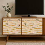Dune lines wallpaper with desert pattern, featuring gold, tan and gray shapes.
