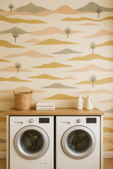 Dune lines wallpaper with neutral tones and a desert landscape pattern on the wall.