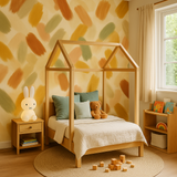 Painter’s Palette Wallpaper with colorful brushstroke pattern in a children's room setting.
