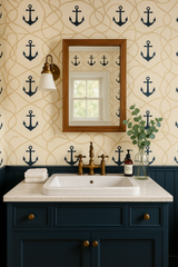 Anchors Away Wallpaper featuring blue anchor motifs over a light yellow backdrop with rope detailing.
