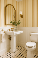 Striped Regency wallpaper with yellow and white stripes, featuring traditional styling.
