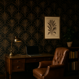 Art deco palm wallpaper with a gold fan pattern on a dark background.