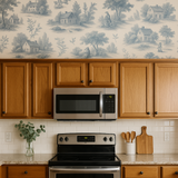 Toile de Jouy wallpaper with a pastoral blue pattern on a neutral background.
