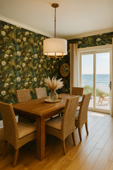 Botanical Cypress Veil Wallpaper with floral accents, featuring a tropical pattern and lush greenery.
