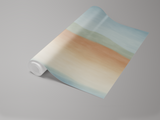 Desert Horizon Wallpaper with watercolor-style stripes by an unknown brand on a rolled-up sample.