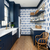 Blue Valentine Ledger Wallpaper with heart pattern on a laundry room wall.