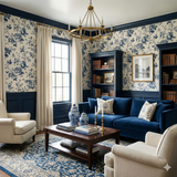 Hartford Sketch Wallpaper with blue floral pattern, covering a living room wall.