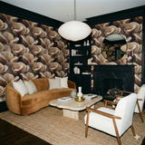 Floral study wallpaper with brown and beige magnolia blooms on the walls.