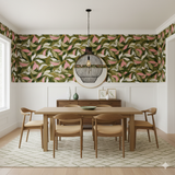 Floral verdant muse wallpaper with a leaf pattern, styled in a dining room with furniture.