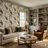 Patterned Magnolia Marsh Wallpaper with heron design, covering the walls of a traditionally styled living room.