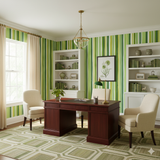 Verdant lines wallpaper with green stripes, shown installed in a room with natural light and neutral-colored furnishings.
