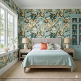 Botanical wallpaper with citrus pattern from Valmere, accenting a stylishly decorated bedroom.
