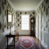 Patterned Ironwood Manor Wallpaper with dog portraits covering the wall, in a traditional room.