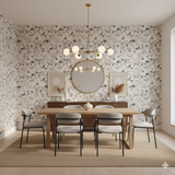 Glacier Stone Wallpaper featuring a terrazzo pattern with gray, beige, and amber stone fragments.
