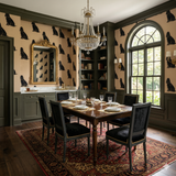 Patterned Silhouette Sonata Wallpaper with black dog silhouettes, shown in a traditionally decorated dining room.
