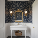Astral Vine Wallpaper with a navy botanical pattern covering the walls in a traditional-style powder room.
