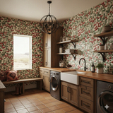Patterned Cranberry Crawl Wallpaper with a cherry and leaf design, covering the walls in a laundry room.