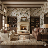 Whisper almond wallpaper with floral pattern, covering a living room wall with a fireplace and built-in bookshelves.