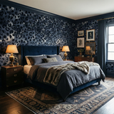 Blue animal print wallpaper by Candice Olson, shown covering a bedroom's walls with patterned design.
