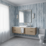Frosted Grove Wallpaper with a birch tree pattern over a blue backdrop.