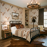 Cattleman’s Creed Wallpaper featuring a repeated longhorn skull pattern, installed in a bedroom.

