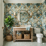 Citrus Atelier wallpaper with orange fruit design on a blue botanical patterned background, Valmere.
