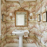 Orchard blossom rows wallpaper, showing a tree pattern with pink flowers on a light background.

