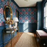 Floral wallpaper in blue and coral hues, against a paneled wall, with gold accents.