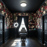 Skull and floral patterned wallpaper by Saint Mortem, featuring dark and light neutrals with red accents.