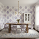 Lavender haze medallion wallpaper with subtle damask pattern and floral accents.