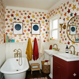 Star-themed wallpaper with crayon drawing design, featuring colorful stars against an off-white background.
