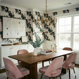 Patterned Mistwake Wallpaper with circles, styled in dining room with modern gold chandelier.