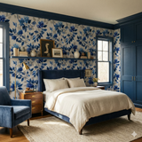 Ashcombe Blue Wallpaper with floral pattern on the wall of a bedroom.