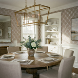 Patterned lattice wallpaper featuring white geometric shapes, in a dining room setting.