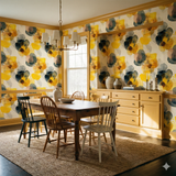 Citrine Bloom Wallpaper with yellow flower pattern, covering dining room walls.