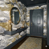 Clouded Shore Wallpaper with a painterly cloudscape pattern, featuring gold and gray accents.