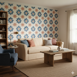 Blue Mesa Quilt Wallpaper with blue and peach floral pattern covering the wall of a living room setting.