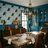 Blue wallpaper with bird pattern, decorative background for a dining room.