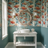 Coral Ledger Wallpaper with orange fish pattern on a blue background.